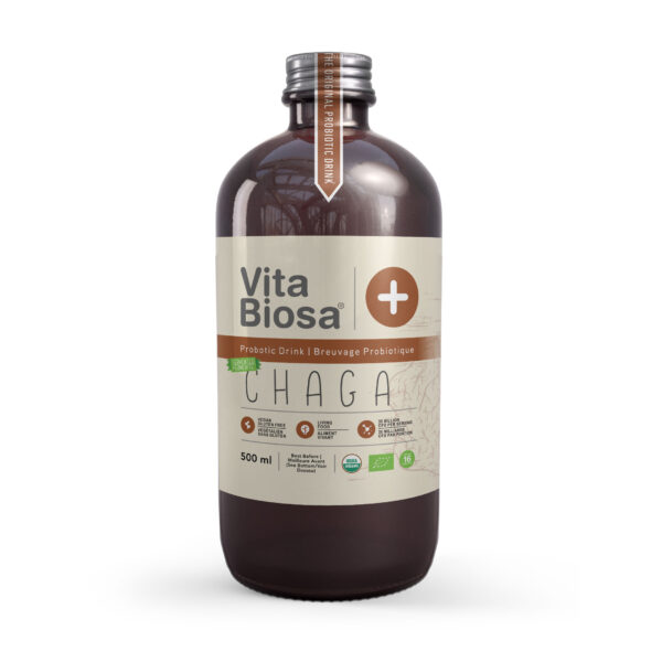 Close-up of a bottle of Vita Biosa Chaga Probiotic Drink surrounded by fresh ingredients, showcasing its natural and wholesome composition.