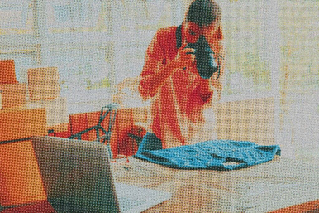 A woman taking photos of her farm products for social media marketing, showcasing her produce with a smartphone. This image represents Localtarian's dedication to helping small businesses and farms leverage social media for growth and community engagement.